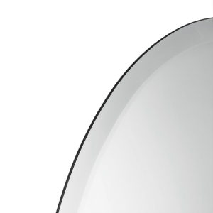 Close-up angle shot of frameless beveled oval copper-free mirror