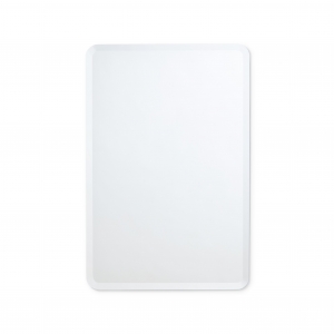 Frameless beveled rounded rectangle mirror hanging on white wall