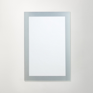 Frosted border rectangle mirror hanging on beige wall