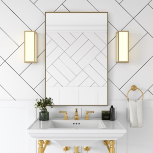 Gold metal framed rectangle hanging on bathroom wall above single sink vanity