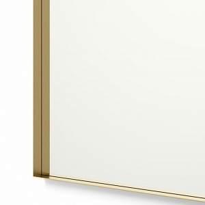 Close-up angle shot of gold framed rectangle mirror