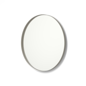 Angled view of nickel framed metal framed round mirror
